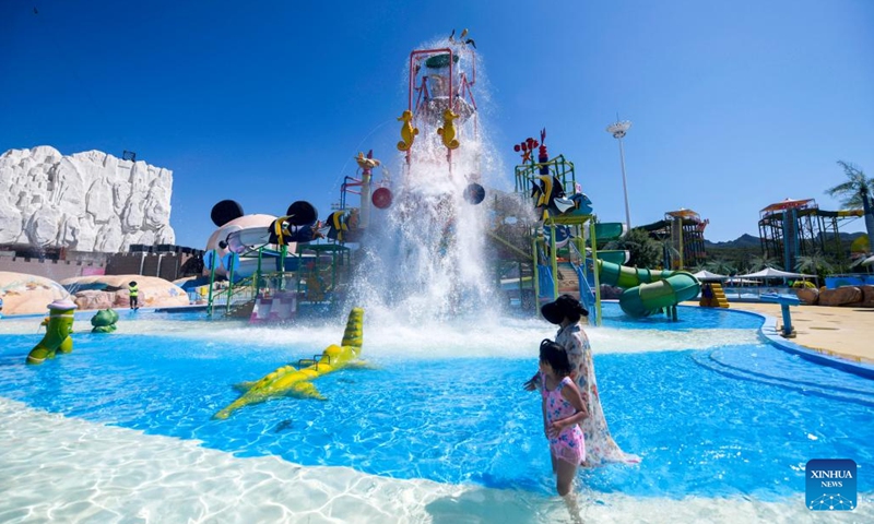 People play in a water amusement zone at a scenic area in Kuancheng Manchu Autonomous County, north China's Hebei Province, June 29, 2023.(Photo: Xinhua)