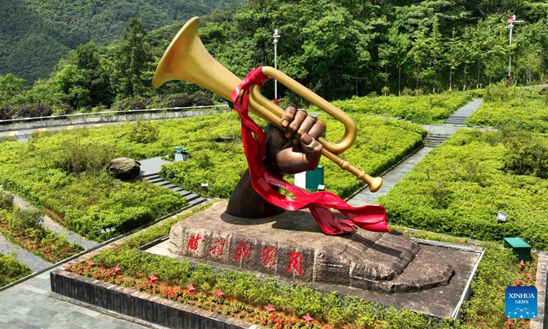 This aerial photo taken on June 28, 2023 shows a statue in Jinggangshan, east China's Jiangxi Province. Jinggangshan, which boasts both pristine natural scenery and the cultural heritage of the revolution, has become a famous tourist destination for visitors from home and abroad(Photo: Xinhua)