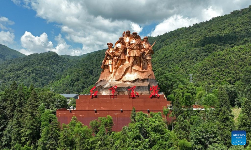 This aerial photo taken on June 28, 2023 shows a sculpture representing Red Army soldiers in Jinggangshan, east China's Jiangxi Province. Jinggangshan, which boasts both pristine natural scenery and the cultural heritage of the revolution, has become a famous tourist destination for visitors from home and abroad.(Photo: Xinhua)