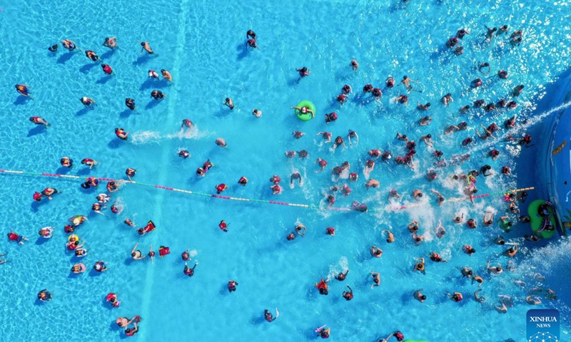 This aerial photo taken on June 29, 2023 shows people playing in a water amusement zone at a scenic area in Kuancheng Manchu Autonomous County, north China's Hebei Province(Photo: Xinhua)