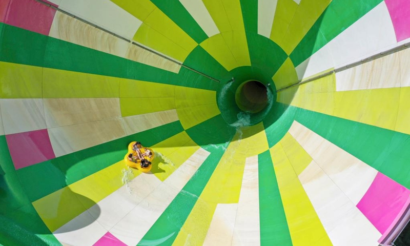 This aerial photo taken on June 29, 2023 shows people playing in a water amusement zone at a scenic area in Kuancheng Manchu Autonomous County, north China's Hebei Province.(Photo: Xinhua)