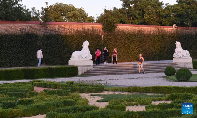 People visit the Belvedere Garden in Vienna, Austria, on July 2, 2023. (Xinhua/He Canling)