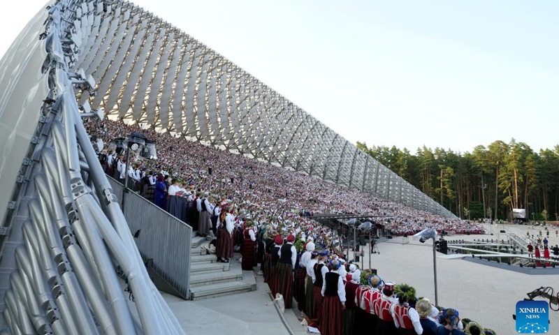 People attend the XXVII Nationwide Latvian Song and XVII Dance Festival in Riga, Latvia, on July 5, 2023. The XXVII Nationwide Latvian Song and XVII Dance Festival, which marks the 150th year of the Song Festival tradition, takes place in Riga from June 30 to July 9. (Photo: Xinhua)