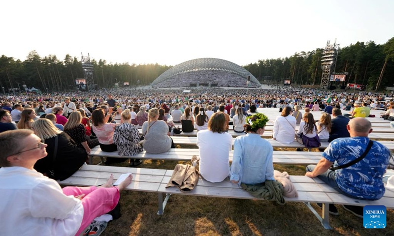 People attend the XXVII Nationwide Latvian Song and XVII Dance Festival in Riga, Latvia, on July 5, 2023. The XXVII Nationwide Latvian Song and XVII Dance Festival, which marks the 150th year of the Song Festival tradition, takes place in Riga from June 30 to July 9. (Photo: Xinhua)