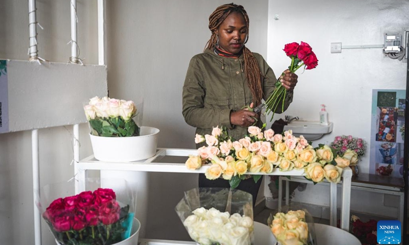 A vendor trims flowers at a flower shop in Nairobi, Kenya on July 4, 2023. Kenya is one of the world's leading exporters of cut flowers. Its flower exports are among the top foreign exchange sources alongside tea, diaspora remittances and tourism.((Photo: Xinhua)