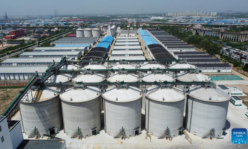 This aerial photo taken on July 5, 2023 shows warehouses at Dagang branch of Central Grain Reserve Tianjin Dongli Direct Warehouse Co., Ltd. in north China's Tianjin, July 5, 2023. Twenty-three new warehouses are put into use at Dagang branch of Central Grain Reserve Tianjin Dongli Direct Warehouse Co., Ltd., adding a total storage capacity of about 200,000 tons to the major grain reserve depot in Tianjin.(Photo: Xinhua)