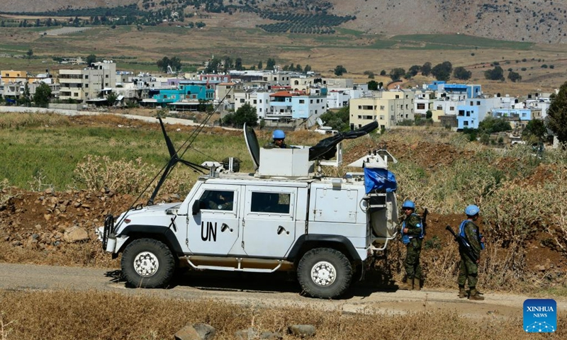 UNIFIL soldiers patrol along a road near the Lebanese-Israeli border in the town of Al-Wazzani, Lebanon, on July 6, 2023.(Photo: Xinhua)