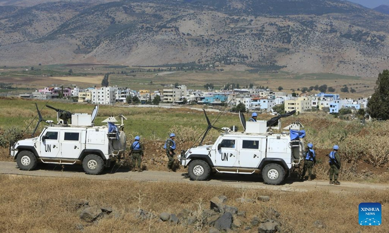 UNIFIL soldiers patrol along a road near the Lebanese-Israeli border in the town of Al-Wazzani, Lebanon, on July 6, 2023.(Photo: Xinhua)