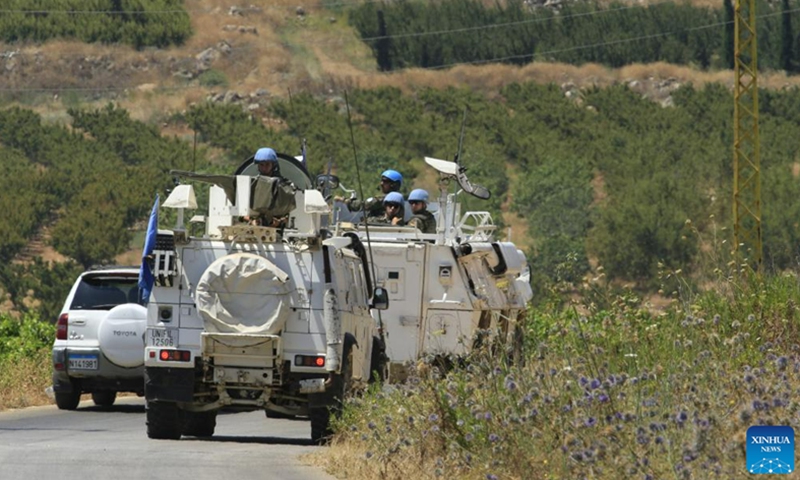 UNIFIL soldiers patrol along a road near the Lebanese-Israeli border in the town of Al-Wazzani, Lebanon, on July 6, 2023.(Photo: Xinhua)