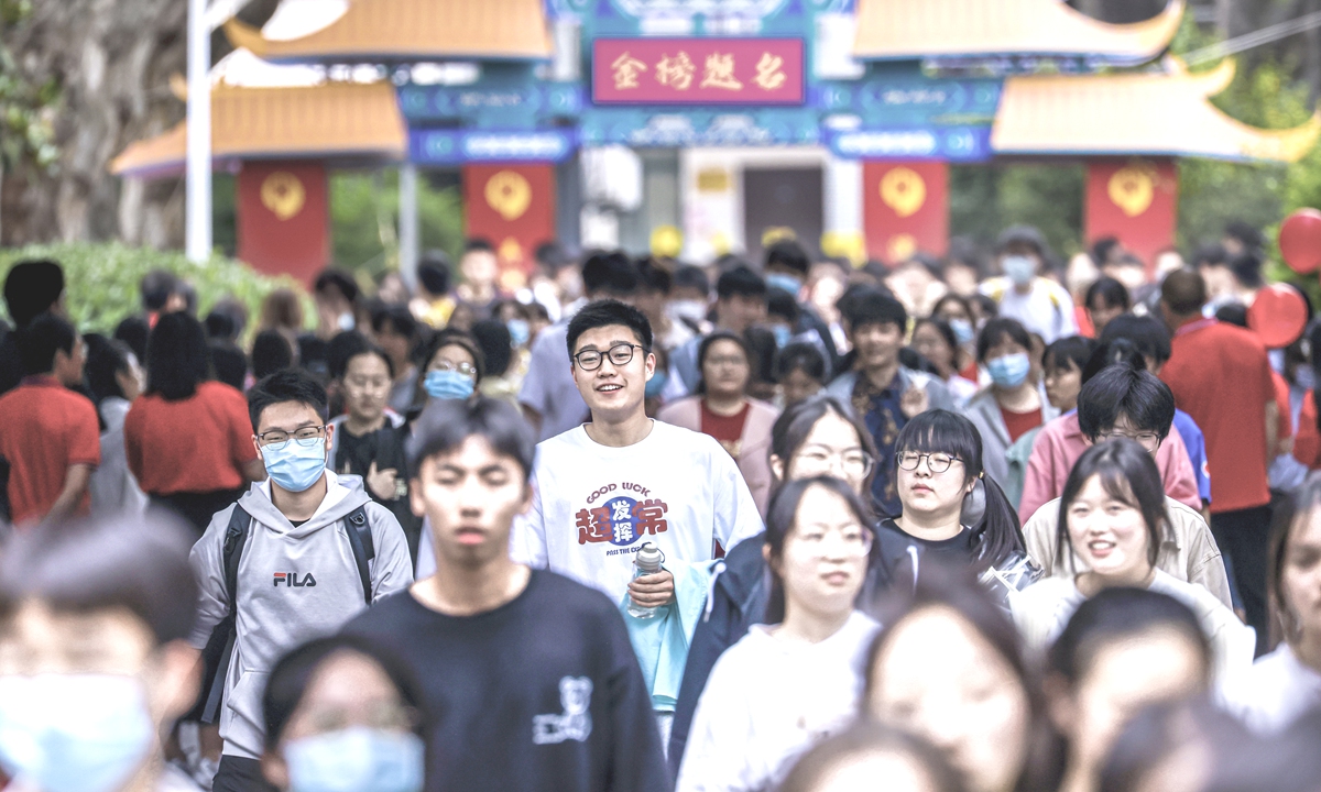 Students walk out of the exam hall after taking the <em>gaokao</em> at the No. 9 Middle School test center in Nanjing, East China's Jiangsu Province on June 7, 2023. Photo: VCG