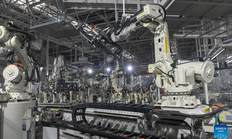 Welding robots work at a welding workshop of sedan manufacturer FAW-Hongqi in Changchun, northeast China's Jilin Province, July 6, 2023.(Photo: Xinhua)