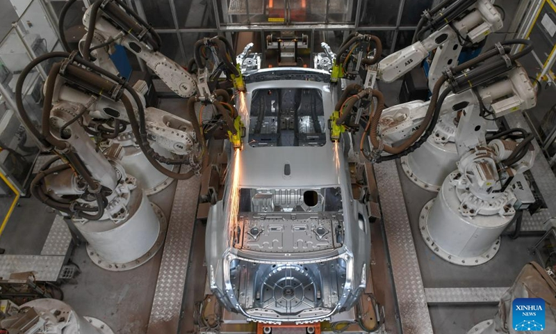 Welding robots work at a welding workshop of sedan manufacturer FAW-Hongqi in Changchun, northeast China's Jilin Province, July 6, 2023.(Photo: Xinhua)