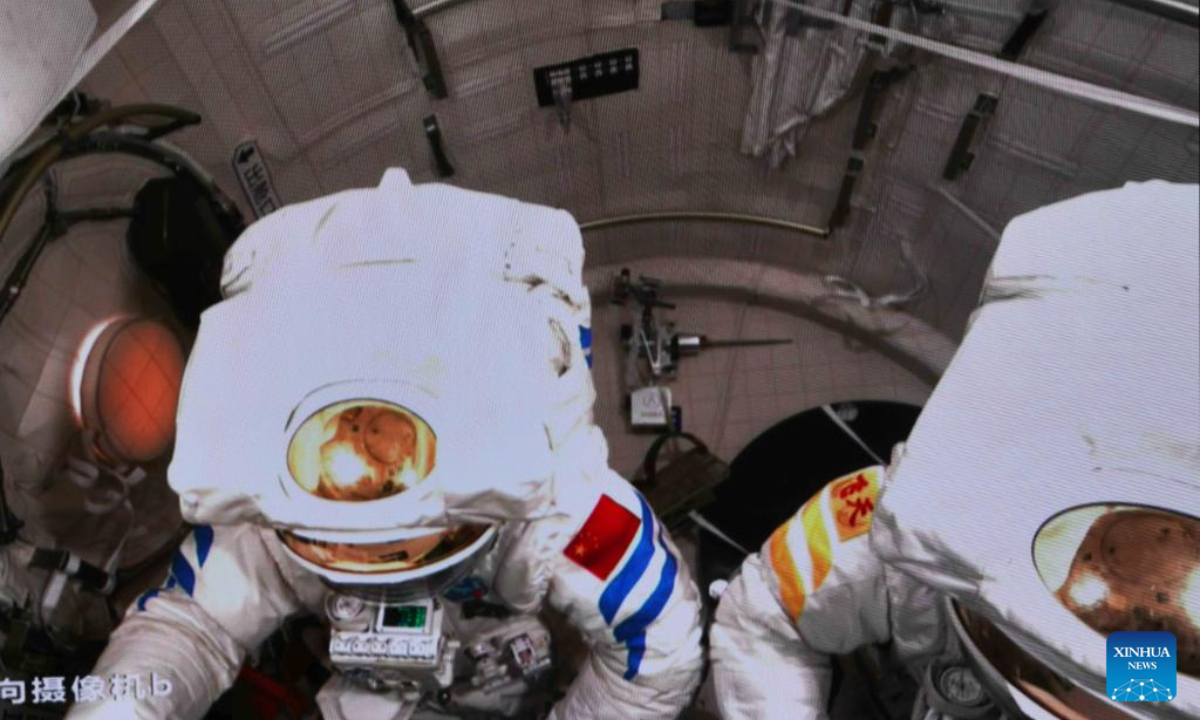 This screen image captured at Beijing Aerospace Control Center on July 20, 2023 shows Shenzhou-16 astronauts Jing Haipeng (L) and Zhu Yangzhu preparing to exit the Wentian lab module. Photo:Xinhua