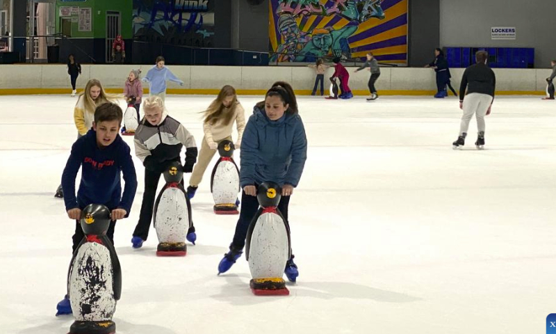 People skate at an ice rink in Johannesburg, South Africa, July 15, 2023. (Xinhua/Zhang Yudong)