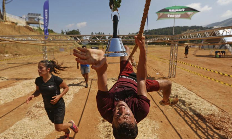 Participants take part in the Hannibal race in the Ain Zhalta area, Lebanon, on July 9, 2023. (Xinhua/Bilal Jawich)