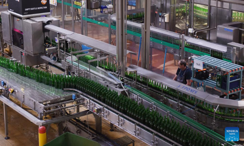 A staff member works at Pilsner Urquell brewery in Pilsen, the Czech Republic, July 22, 2023. (Xinhua/He Canling)