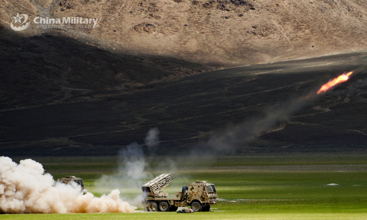 Vehicle-mounted rocket launchers attached to an artillery element of a regiment under the PLA Xinjiang Military Command fire at mock targets during a live-fire training exercise in early July, 2023. Photo: China Military