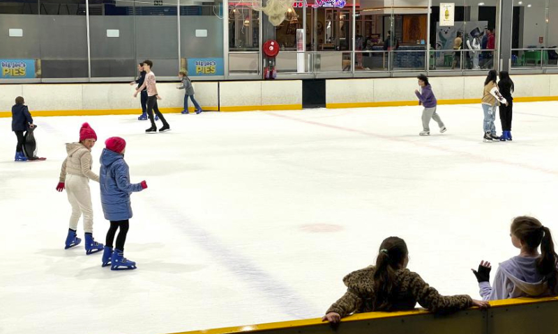 People skate at an ice rink in Johannesburg, South Africa, July 15, 2023. (Xinhua/Zhang Yudong)