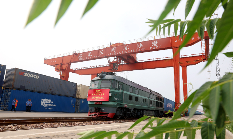 The first China-Vietnam train Yanzhao bound for Hanoi sets off from the Shijiazhuang International Land Port in Shijiazhuang, North China's Hebei Province, on July 24, 2023. The train is loaded with 46 standard containers of hardware, fertilizer and other commodities and will travel for about seven days. The port plans to send one train per week to Vietnam. Photo: VCG