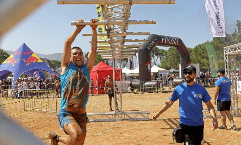 Participants take part in the Hannibal race in the Ain Zhalta area, Lebanon, on July 9, 2023. (Xinhua/Bilal Jawich)