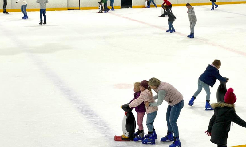 People skate at an ice rink in Johannesburg, South Africa, July 15, 2023. (Xinhua/Zhang Yudong)