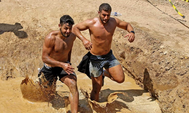 Participants take part in the Hannibal race in the Ain Zhalta area, Lebanon, on July 9, 2023. (Xinhua/Bilal Jawich)