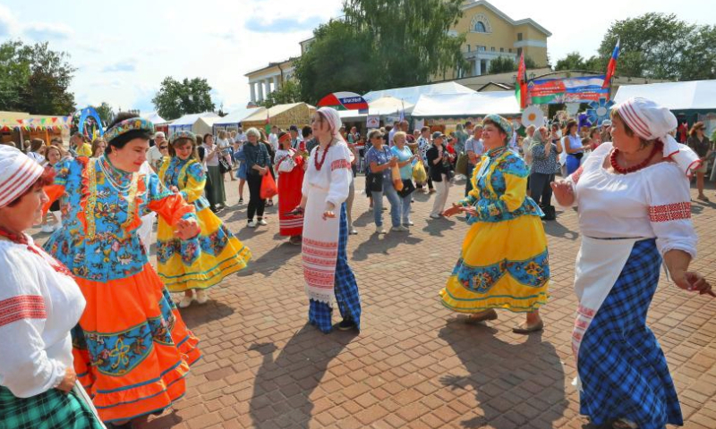 Actresses perform folk dance during the 32nd International Festival of Arts Slavianski Bazaar in Vitebsk, Belarus, July 14, 2023. (Photo by Henadz Zhinkov/Xinhua)