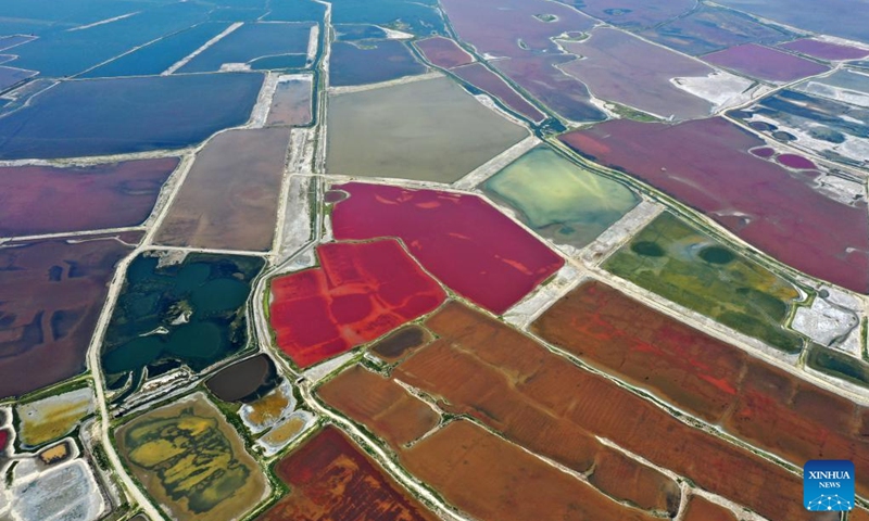 This aerial photo taken on July 11, 2023 shows the Salt Lake in Yuncheng City, north China's Shanxi Province. Yuncheng Salt Lake has a history of over 4,600 years of exploitation, with profound cultural heritage and significant historical value. In recent years, local authority has insisted on giving priority to protection and green development and stopped all industrial production within the protection area of the lake, in a bid to promote industrial transformation and upgrading according to local conditions.(Photo: Xinhua)