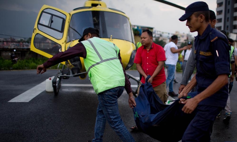 Bodies of six victims of a helicopter crash are airlifted to Kathmandu, Nepal, on July 11, 2023. All six people, including five Mexican tourists and a Nepali pilot, were killed after their helicopter crashed on Tuesday in a mountain district in eastern Nepal, the authorities said.(Photo: Xinhua)