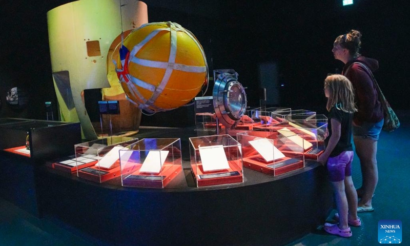 People look at a life-size model of the Deepsea Challenger during James Cameron-Challenging the Deep exhibition at Science World in Vancouver, British Columbia, Canada, on July 10, 2023. James Cameron-Challenging the Deep is an immersive exhibition that showcases the filmmaker's achievements and innovations in deep-sea exploration and filmmaking.(Photo: Xinhua)