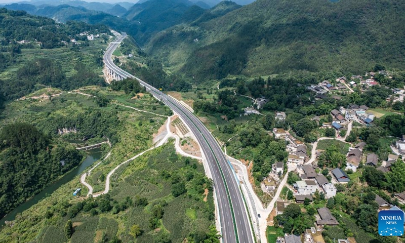 This aerial photo taken on July 10, 2023 shows a section of the Dejiang-Yuqing expressway in southwest China's Guizhou Province. The Dejiang-Yuqing expressway was completed and opened to traffic on Monday, which has a total length of 104.324 kilometers and connects five counties including Dejiang, Sinan, Fenggang, Shiqian and Yuqing of the cities of Tongren and Zunyi in Guizhou.(Photo: Xinhua)