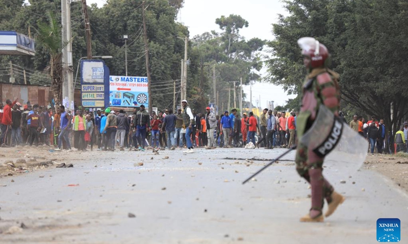 An anti-riot police beefs up security during protests in Mathare slum in Nairobi, capital of Kenya, on July 12, 2023. At least five people were reportedly shot dead and others sustained gunshot wounds on Wednesday during protests across Kenya over the high cost of living(Photo: Xinhua)