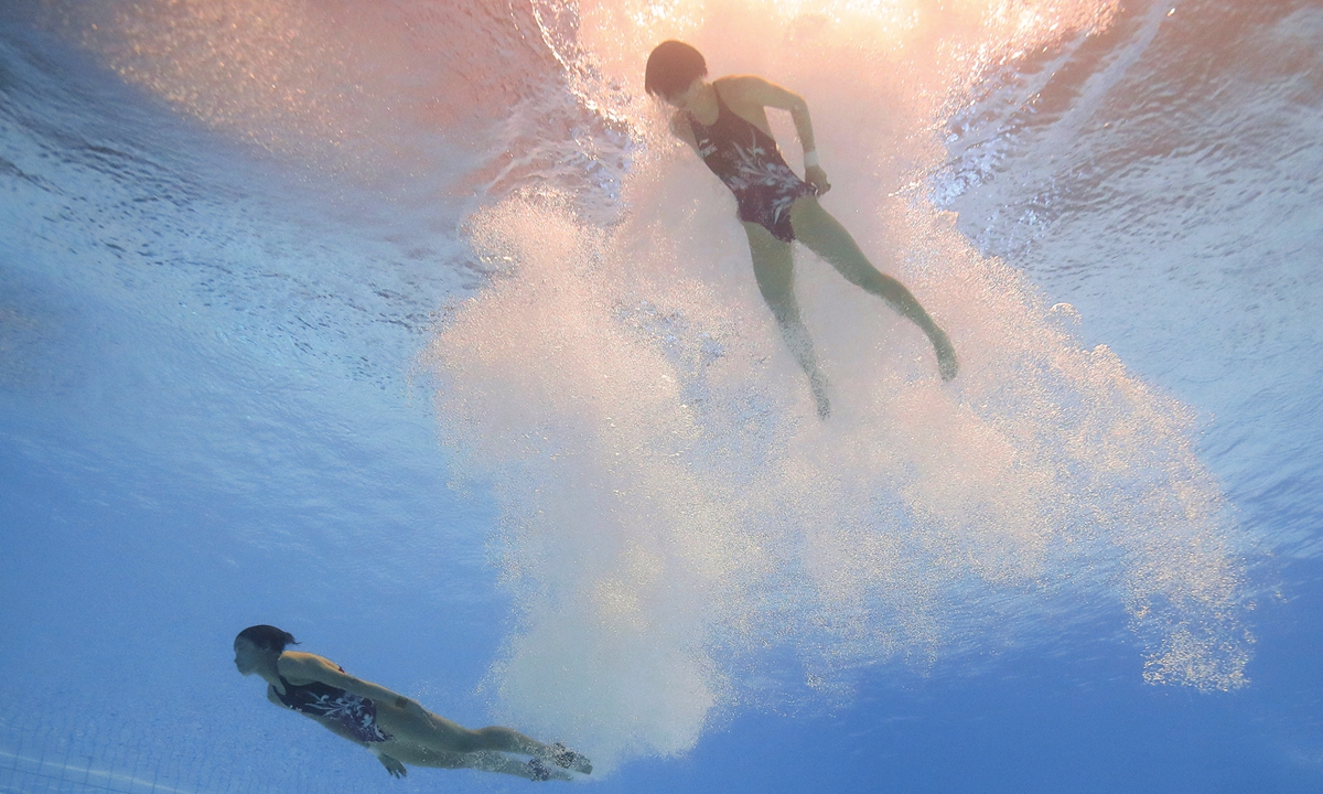 Chen Yuxi and Quan Hongchan of Team China compete in the Women's Synchronised 10 meters Platform Final on Day Three of the Fukuoka 2023 World Aquatics Championships in Fukuoka, Japan on July 16, 2023. Photo: VCG