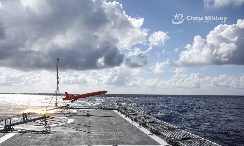 The guided-missile frigate Mianyang attached to a frigate flotilla with the navy under the PLA Southern Theater Command launches a target drone during a maritime combat training exercise in mid July, 2023. (eng.chinamil.com.cn/Photo by Ge Hanqiang and Zhang Weifeng)