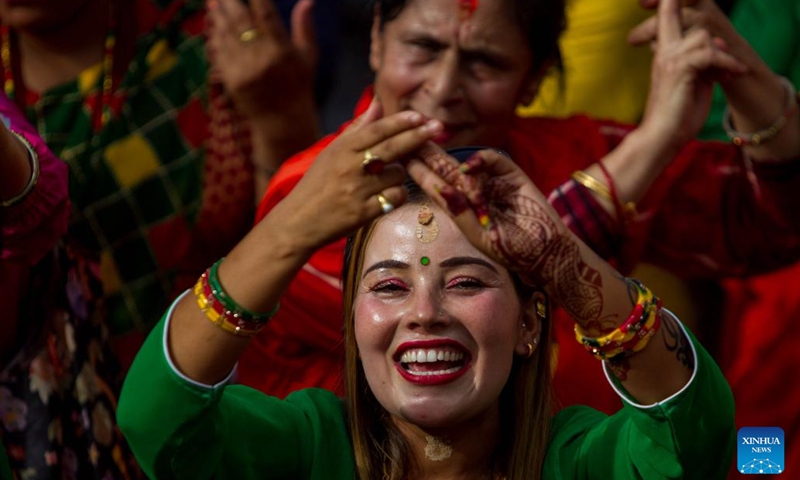 Hindu devotees pray at Pashupatinath Temple in Kathmandu, Nepal, July 17, 2023. The holy month of Shrawan is considered auspicious as people offer prayers to Lord Shiva.(Photo: Xinhua)