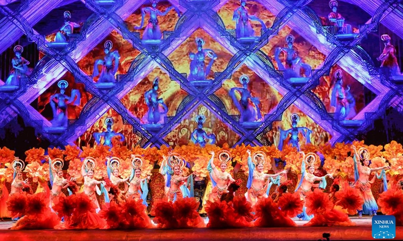 Actors perform during the opening ceremony of the 6th China Xinjiang International Dance Festival in Urumqi, northwest China's Xinjiang Uygur Autonomous Region, July 20, 2023. An international dance festival opened Thursday in Urumqi, the capital of northwest China's Xinjiang Uygur Autonomous Region, attracting artists to showcase their dances in an international arena.(Photo: Xinhua)