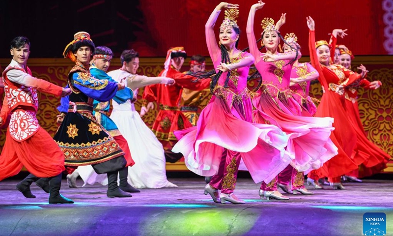 Actors perform during the opening ceremony of the 6th China Xinjiang International Dance Festival in Urumqi, northwest China's Xinjiang Uygur Autonomous Region, July 20, 2023. An international dance festival opened Thursday in Urumqi, the capital of northwest China's Xinjiang Uygur Autonomous Region, attracting artists to showcase their dances in an international arena.(Photo: Xinhua)