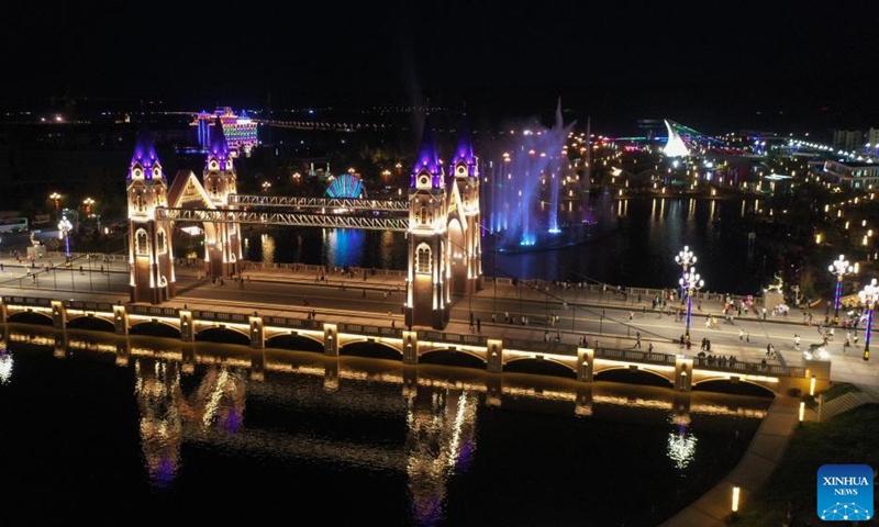 This aerial photo taken on July 18, 2023 shows a view of Qicai river resort in Burqin County of northwest China's Xinjiang Uygur Autonomous Region. With abundant tourism resources, Burqin County has become an increasingly popular destination among travellers.(Photo: Xinhua)