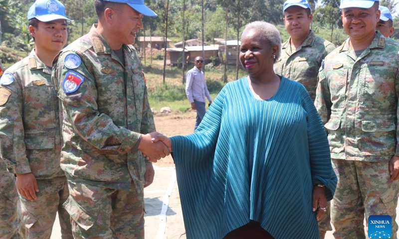 Bintou Keita, special representative of the United Nations Secretary-General in the Democratic Republic of the Congo (DRC) and head of the United Nations Organization Stabilization Mission in the DR Congo (MONUSCO), communicates with engineers of the engineering contingent of the 26th batch of Chinese peacekeeping mission to the DRC, in the Kalehe territory of the South Kivu province in DRC, July 18, 2023. (Photo: Xinhua)