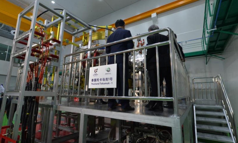 Guests visit the experimental tokamak device in Nakhon Nayok, Thailand, July 25, 2023. Thailand's first experimental tokamak device was officially launched on Tuesday in a joint collaboration with China.

The device, a joint collaboration between the Institute of Plasma Physics Chinese Academy of Sciences (ASIPP) and the Thailand Institute of Nuclear Technology (TINT), arrived in Thailand in January and commenced trial runs in May. (Xinhua/Rachen Sageamsak)