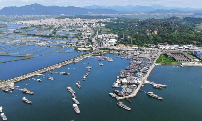 This aerial photo taken on July 28, 2023 shows a fishing port in Raoping County of Chaozhou, south China's Guangdong Province. Raoping County has a long history of aquaculture. By 2022, the county has aquaculture area of 179,000 mu (about 11,933 hectares) and more than 100 aquatic products enterprises with about 4,200 employees. (Xinhua/Wang Ruiping)