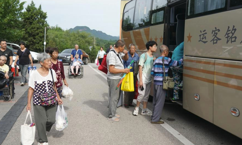 Villagers take a bus to leave a settlement site and return to their homes in Koutou Village of Qinglonghu Town in Fangshan District of Beijing, capital of China, Aug. 5, 2023. As this round of typhoon-induced torrential rains have come to an end in Beijing, some villagers of Fangshan District, who had been evacuated to settlement sites due to heavy rainfall over the previous few days, returned home on Saturday after experts assessed the safety of their residences.

Beijing has, over the past few days, seen the heaviest rainfall since records began 140 years ago. (Xinhua/Zhang Chenlin)