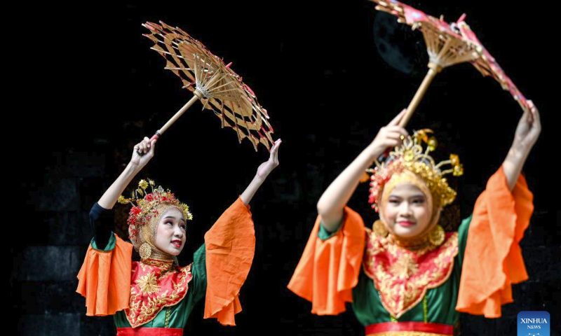 Dancers perform Indonesian traditional dance during Lomba Tari Nusantara at Rumah Budaya Nusantara Puspo Budoyo in South Tangerang, Banten Province, Indonesia, on July 29, 2023. Lomba Tari Nusantara is held to preserve the Indonesian traditional dance among teenagers. (Xinhua/Agung Kuncahya B.)