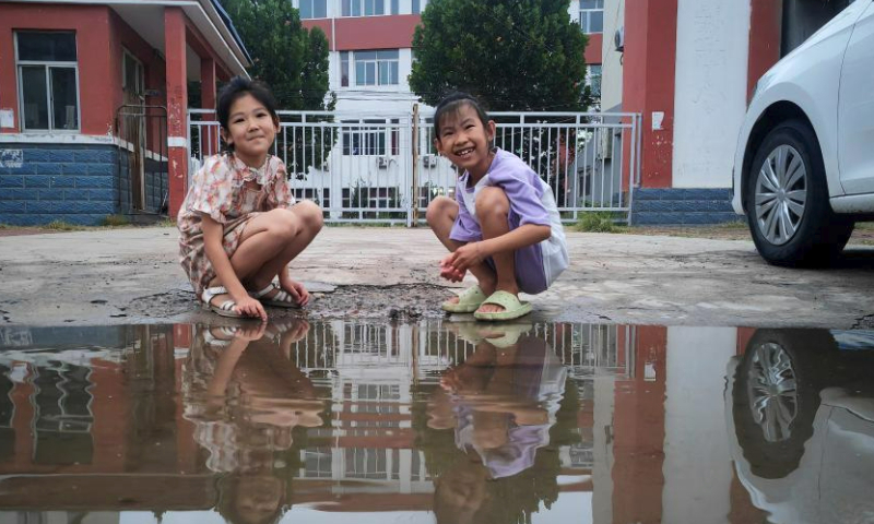 Children play in Wangdagua Town of Pingyuan County, east China's Shandong Province, Aug. 6, 2023. As of 7 a.m. Sunday, a total of 21 people have been injured in the 5.5-magnitude earthquake that struck the county of Pingyuan, in Dezhou City of east China's Shandong Province at 2:33 a.m. Sunday.

A total of 126 buildings in the earthquake zone collapsed, while the transportation, communication and power supply there were normal, and no leak was discovered at oil and gas pipelines, according to local authorities. (Xinhua/Guo Xulei)