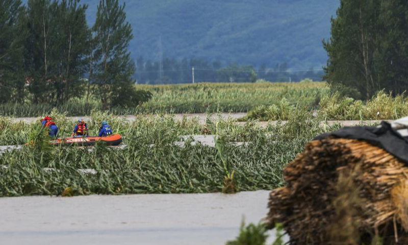 Rescuers carry out rescue and relief operations in Qili Township, Shulan City, northeast China's Jilin Province, Aug. 5, 2023.

Shulan City has been experiencing continuous rainy weather since Tuesday night. About 134,000 people have been affected, with more than 14,300 people evacuated, according to the flood control and drought relief headquarters of Shulan.

Continuous heavy rainfall caused flooding, bridge collapses and road damages in several towns of Shulan. Jilin Province have dispatched many rescue reinforcements to Shulan to offer disaster relief support. (Xinhua/Yan Linyun)