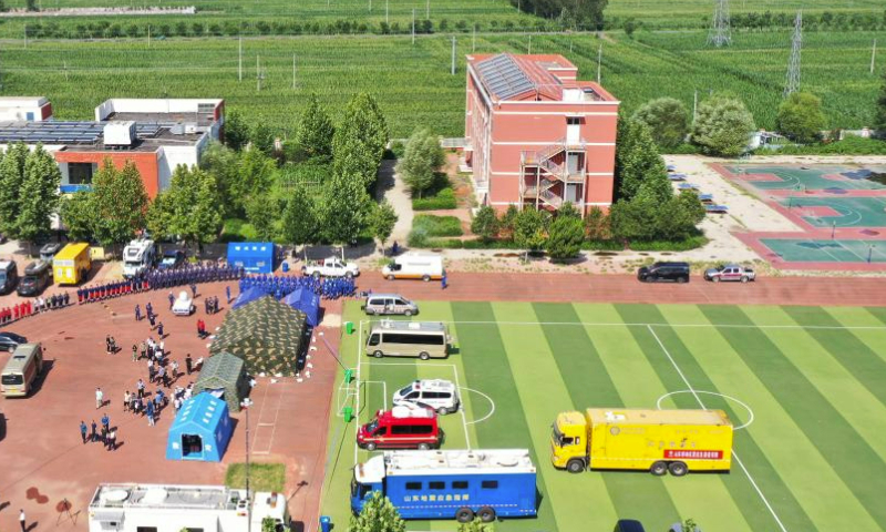 This aerial photo taken on Aug. 6, 2023 shows rescuers gathering at a playground of a primary school in Wangdagua Town of Pingyuan County, east China's Shandong Province. As of 7 a.m. Sunday, a total of 21 people have been injured in the 5.5-magnitude earthquake that struck the county of Pingyuan, in Dezhou City of east China's Shandong Province at 2:33 a.m. Sunday.

A total of 126 buildings in the earthquake zone collapsed, while the transportation, communication and power supply there were normal, and no leak was discovered at oil and gas pipelines, according to local authorities. (Xinhua/Guo Xulei)