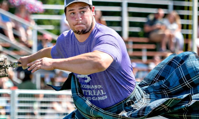 A man takes part in a toss competition during the 2023 Montreal Highland Games in Montreal, Canada, on Aug. 6, 2023. The 2023 Montreal Highland Games were held here Sunday. The games, held annually during summers since 1855, feature traditional Scottish events that include pipe bands, athletes and Highland dancers. (Photo by Andrew Soong/Xinhua)