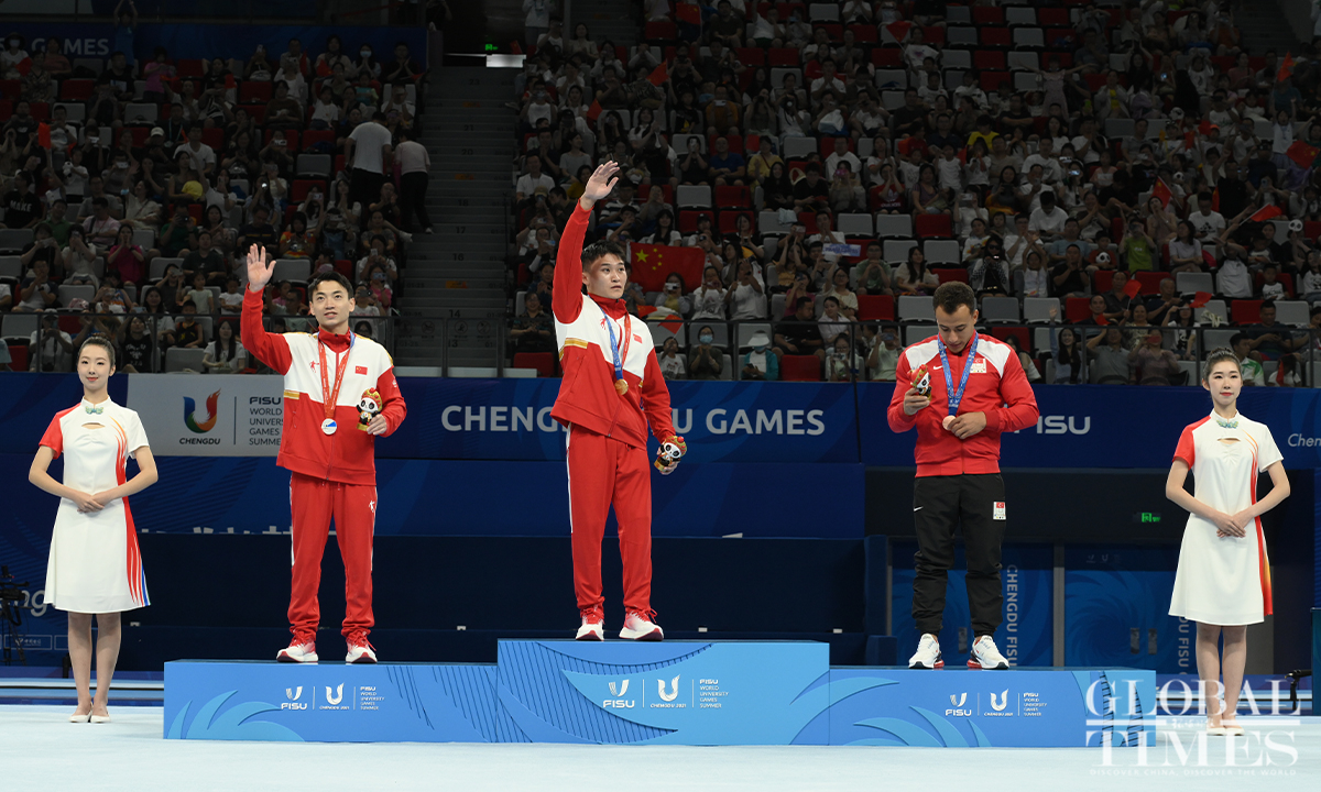 Team China fends off Japanese challenge in artistic gymnastics to sit ...