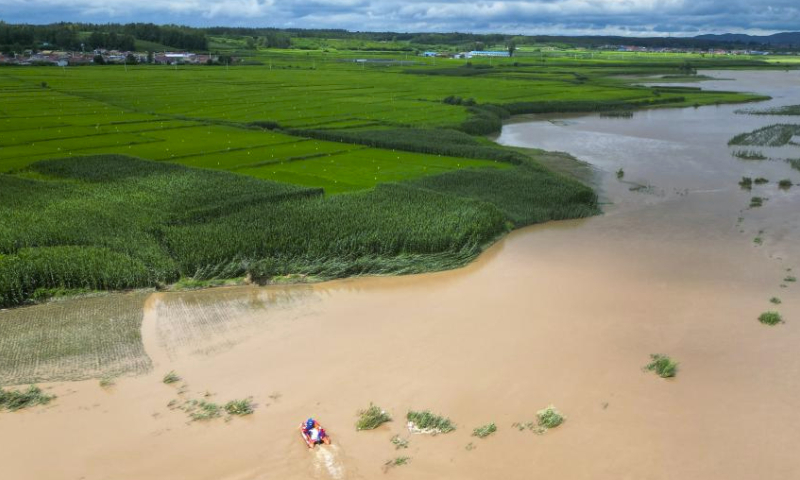 This aerial photo taken on Aug. 5, 2023 shows rescuers carrying out search and rescue operations in a flood-affected area in Qili Township, Shulan City, northeast China's Jilin Province.

Shulan City has been experiencing continuous rainy weather since Tuesday night. About 134,000 people have been affected, with more than 14,300 people evacuated, according to the flood control and drought relief headquarters of Shulan.

Continuous heavy rainfall caused flooding, bridge collapses and road damages in several towns of Shulan. Jilin Province have dispatched many rescue reinforcements to Shulan to offer disaster relief support. (Xinhua/Yan Linyun)