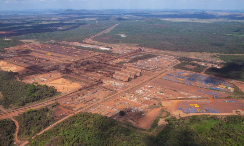 This aerial photo taken on Aug. 3, 2023 shows machinery working at the Carajas Mine, one of the world's largest iron ore mines, in the state of Para in Brazil. (Xinhua/Wang Tiancong)